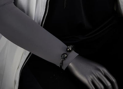 COOLSTEELANDBEYOND Mens Women Black Skull Bone Link Cuff Bangle Bracelet, Stainless Steel, Polished, Elastic Adjustable